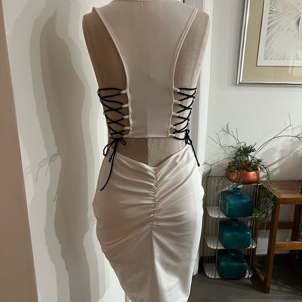 Sexy white knit dress with lace up detail. sz L